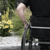 Omobic Flow black brushed ergonomic lightweight handrim for active wheelchairs in action