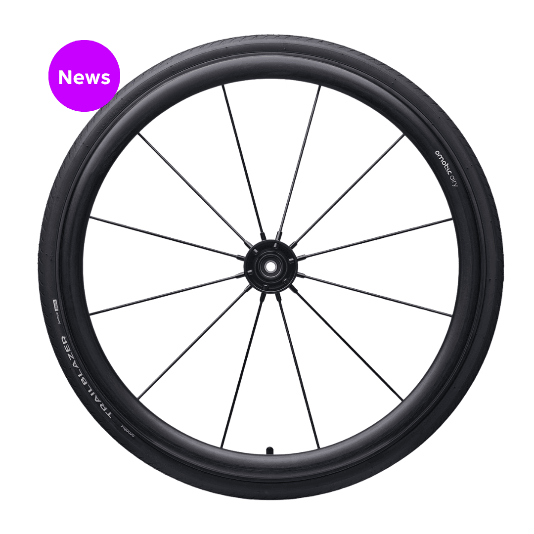Omobic Rebel fiber spoke wheel with airy handrim and trailblazer tyre.